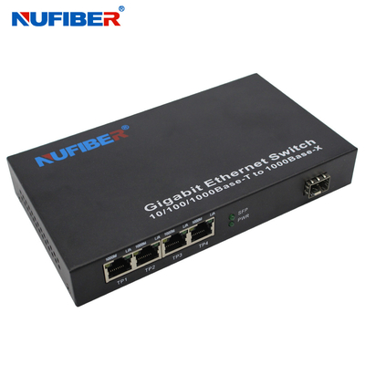 10/100/1000M 4 convertitore a fibra ottica di media del commutatore di Ethernet del porto del porto Rj45+1 SFP